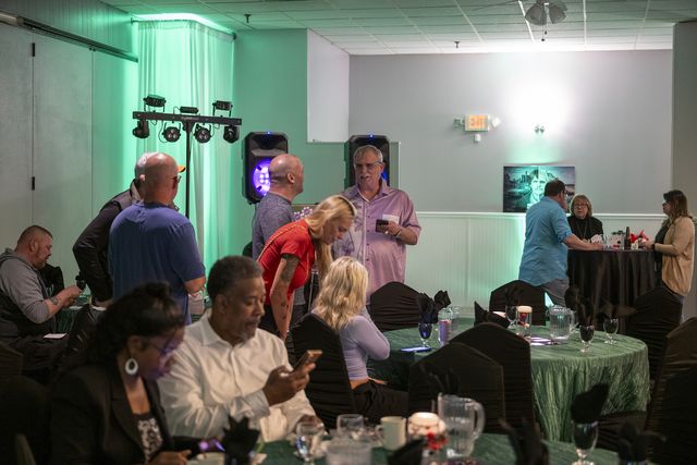 Book release party: Guests mingling around the tables
