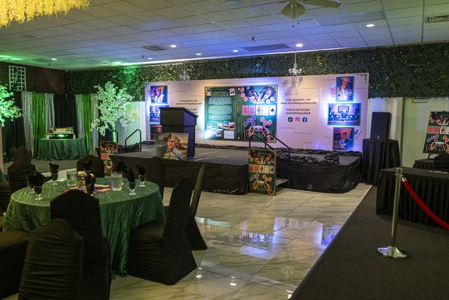 Book release party: Stage area and display wall ready for guests