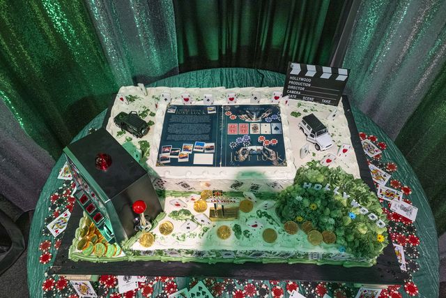Book release party: Book-themed cake decorated with poker chips and playing cards