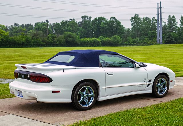G Rides: White convertible with a blue top