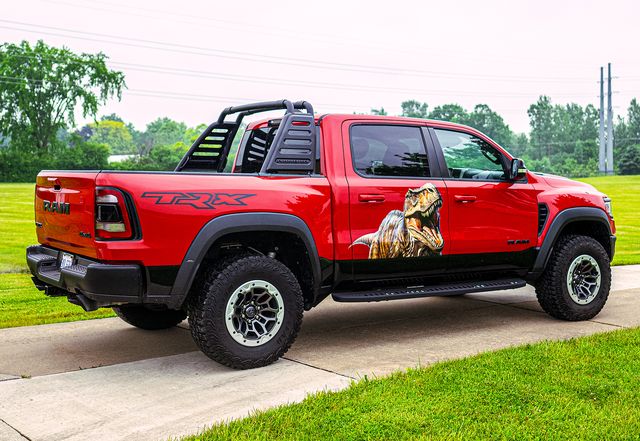 G Rides: Red pickup truck with a custom graphic