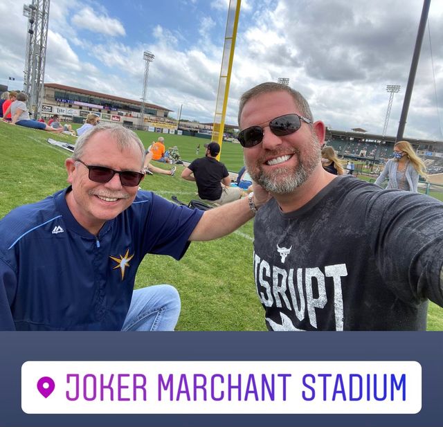 Two men taking a selfie at Joker Marchant Stadium