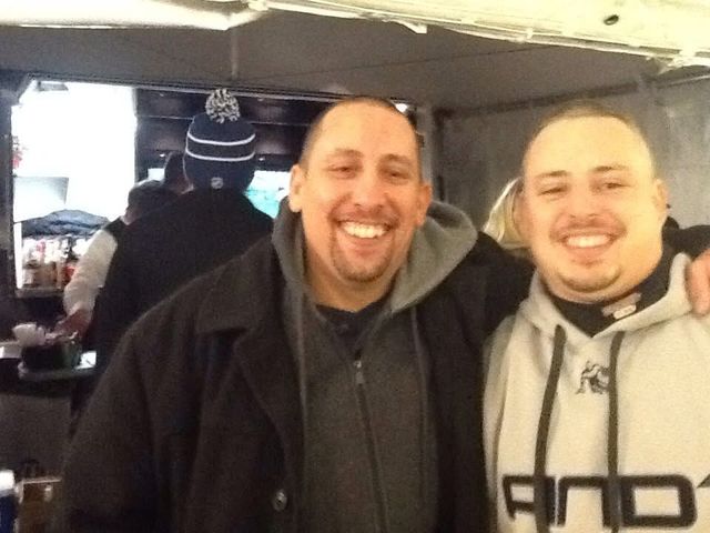 Two men smiling together