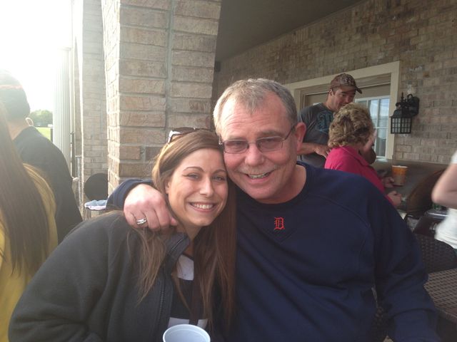 A man and woman at an outdoor gathering