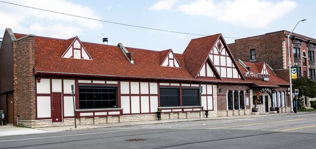 Tudor-style commercial building on a street corner
