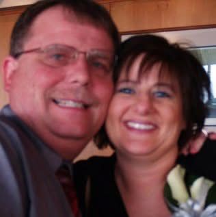 A couple taking a close-up selfie