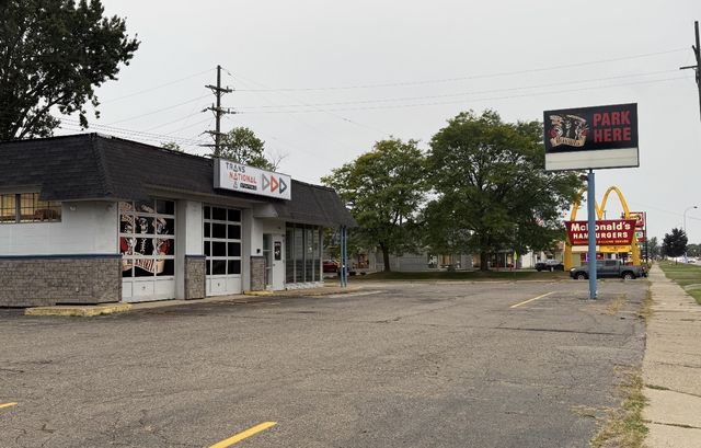 Commercial garage building and parking lot