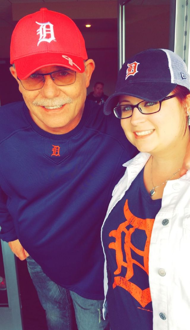 Two people in Detroit Tigers caps