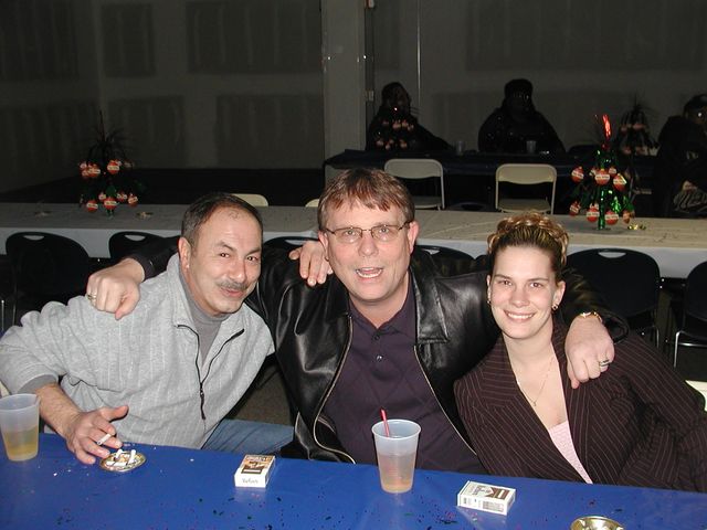 Three friends at a table